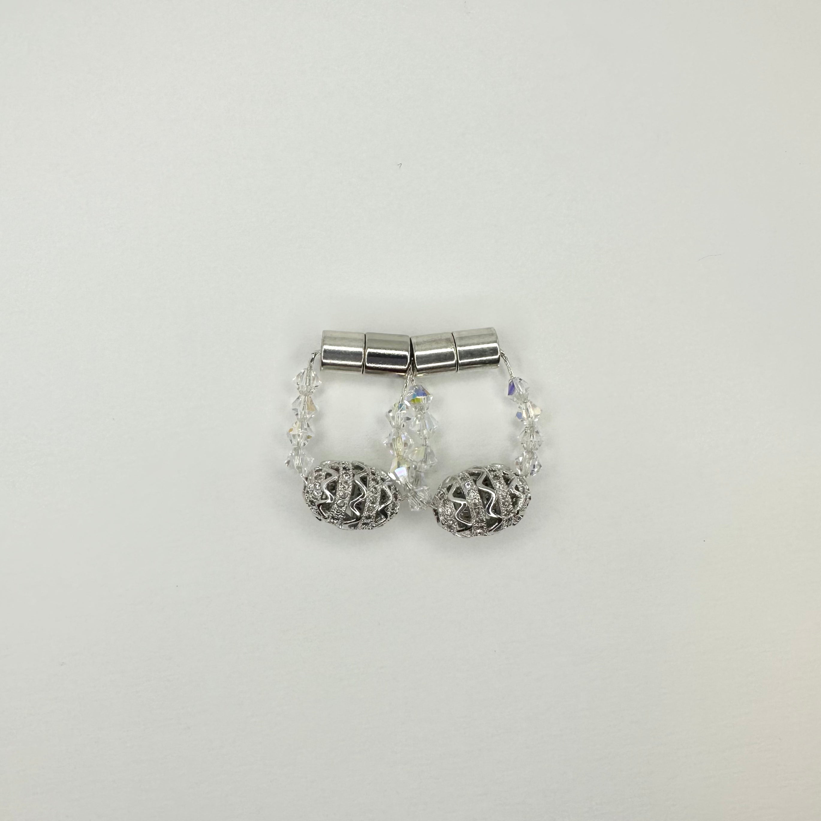 Magnetic outlet nipple rings